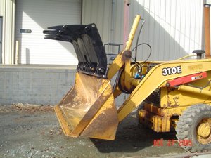 Loader Backhoe Grapple Photo 1