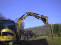 CAT 303.5C CR with hydraulic mini excavator thumb installed by USA Attachments