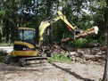 CAT 305 CR excavator with 8\" x 30\" mini excavator thumb installed by USA Attachments