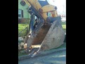 MT1035 mechanical excavator thumb in a closed position