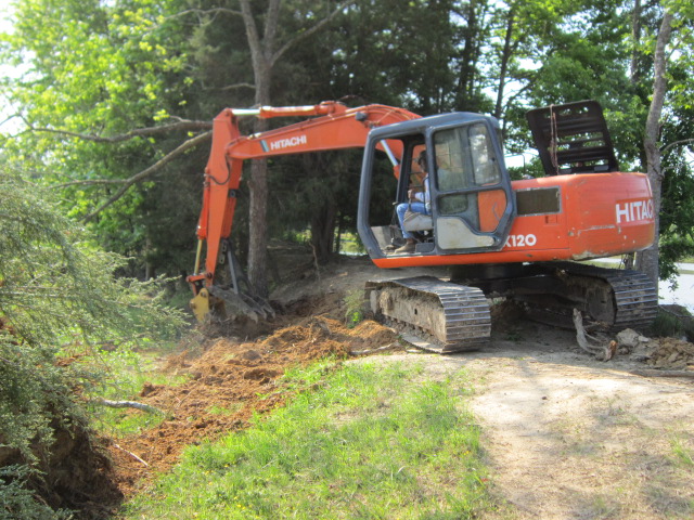 MT1850, 18" x 50" excavator thumb installed on HITACHI EX120 by USA Attachments