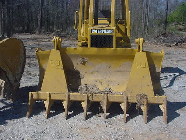 DR-92-8-5X5 dozer root rake installed on a dozer.