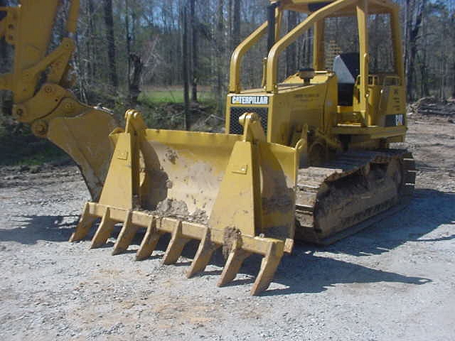 DR-92-8-5X5 rake installed on a dozer