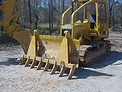 DR-92-8-5X5 rake installed on a dozer