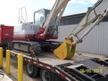 18\" excavator bucket by USA Attachments installed on a Takeuchi TB175