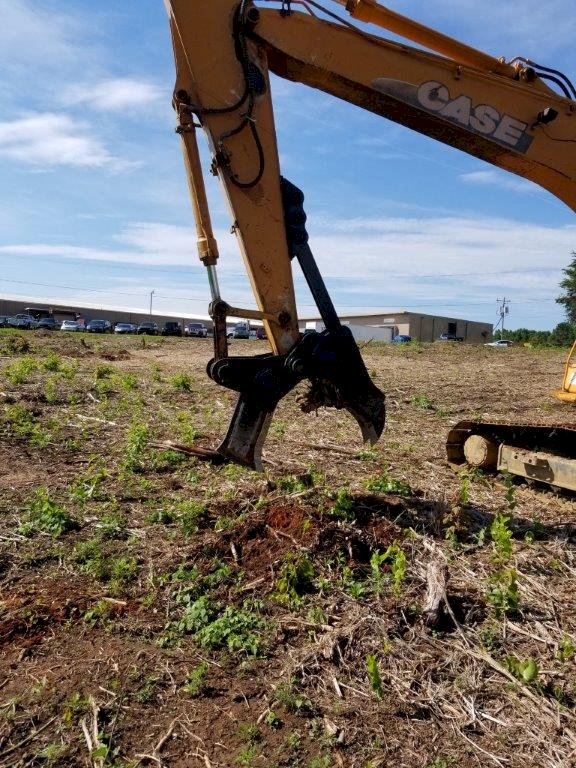 excavator stump splitter installed on a CASE