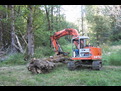 HT1035 hydraulic thumb in the folded position, welded on an excavator