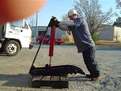 HT1240 hydraulic excavator thumb beside a person