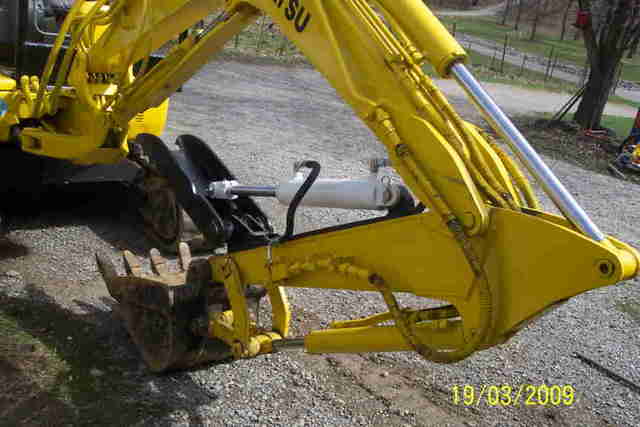 USA Attachments presents the HT830 hydraulic excavator thumb installed on a Komatsu excavator