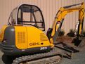 Another view of the HT830 mini excavator thumb installed on GEHL 353 excavator