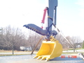 HT830 hydraulic thumb above an excavator bucket