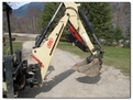 IR backhoe with HT830 mini thumb