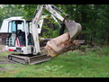 8\" x 30\" mini hydraulic excavator thumb by USA Attachments installed on TEREX HR16