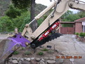8\"x 30\" excavator thumb in the closed position