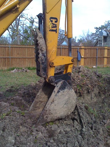 MT1035 excavator thumb installed on a CAT excavator