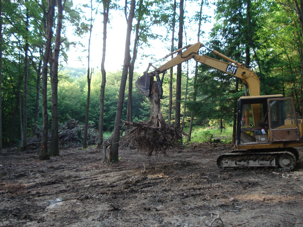 Cat excavator with MT1035 excavator thumb from USA Attachments