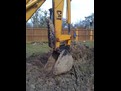 MT1035 excavator thumb installed on a CAT excavator