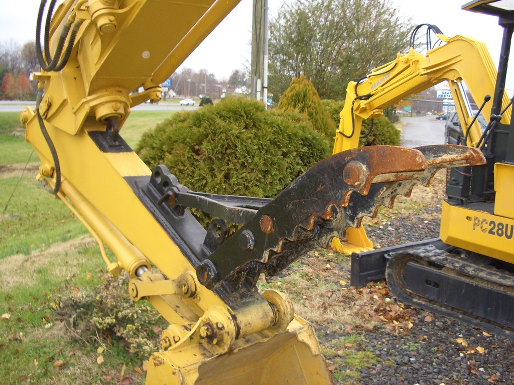 MT1240 excavator thumb installed on a machine.