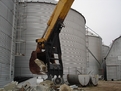 A close up of MT2458 holding blocks inside a bucket.