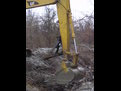 MT2458 thumb installed on a CAT excavator