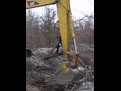 MT2458 thumb installed on a CAT excavator