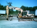 MT2458 thumb installed on CAT 320 B excavator