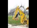 MT618 mini thumb installed on a deere compact loader backhoe