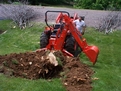 KUBOTA BH90 backhoe with MT618 mini thumb digging