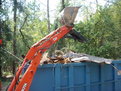 RARRRRRGH! The Kubota L35 tractor backhoe with a MT824 thumb from USA Attachments.